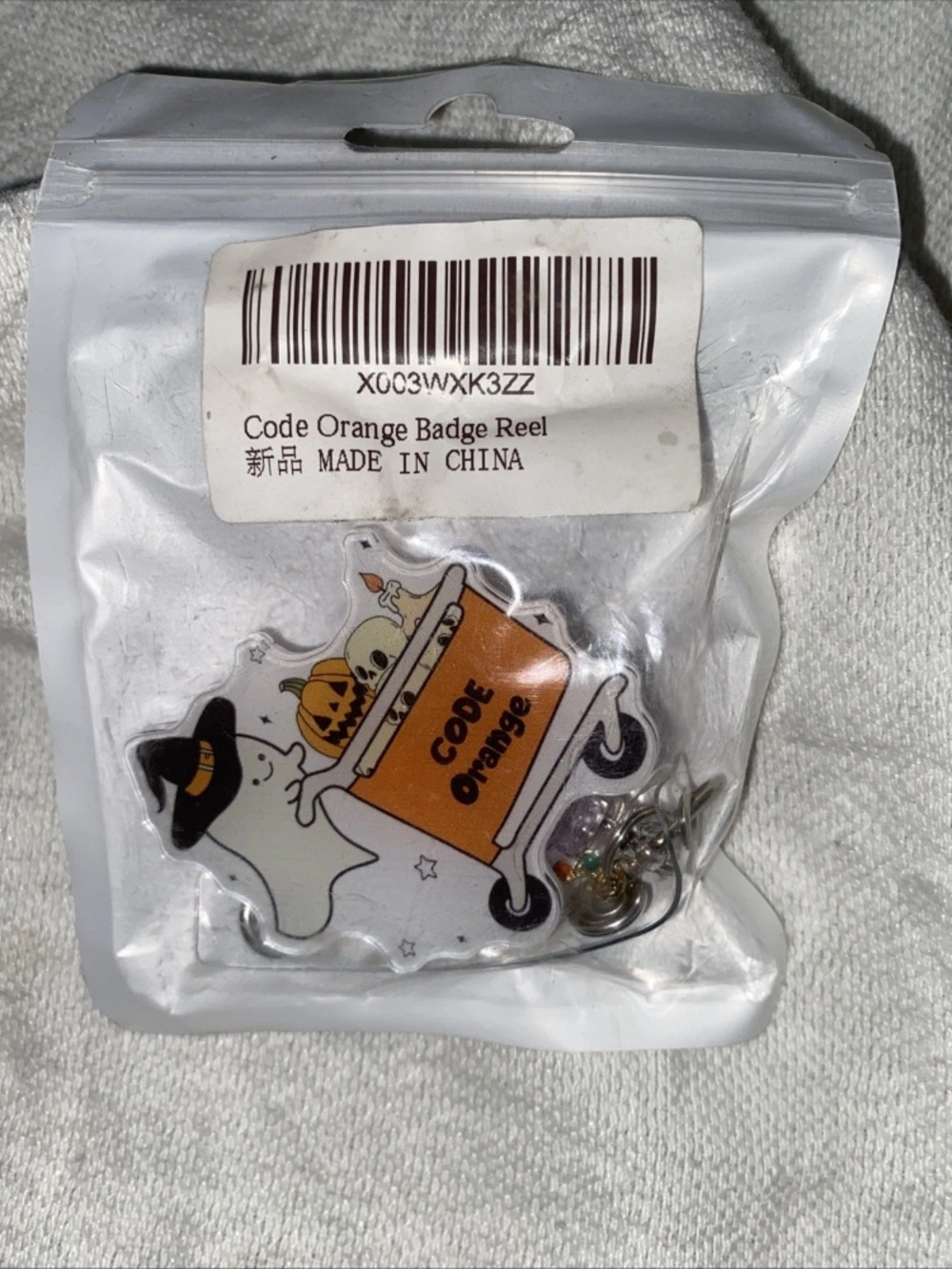 Ghost W Shopping Cart Badge Reel